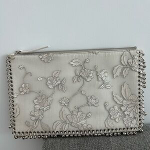 Zimmermann Elegant Silver Floral Wristlet